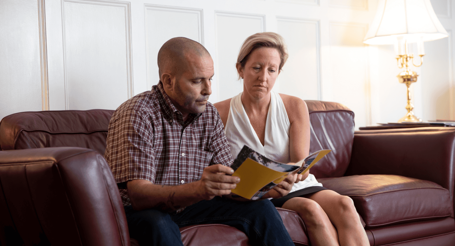 Prospective patient and family member read Austen Riggs literature together