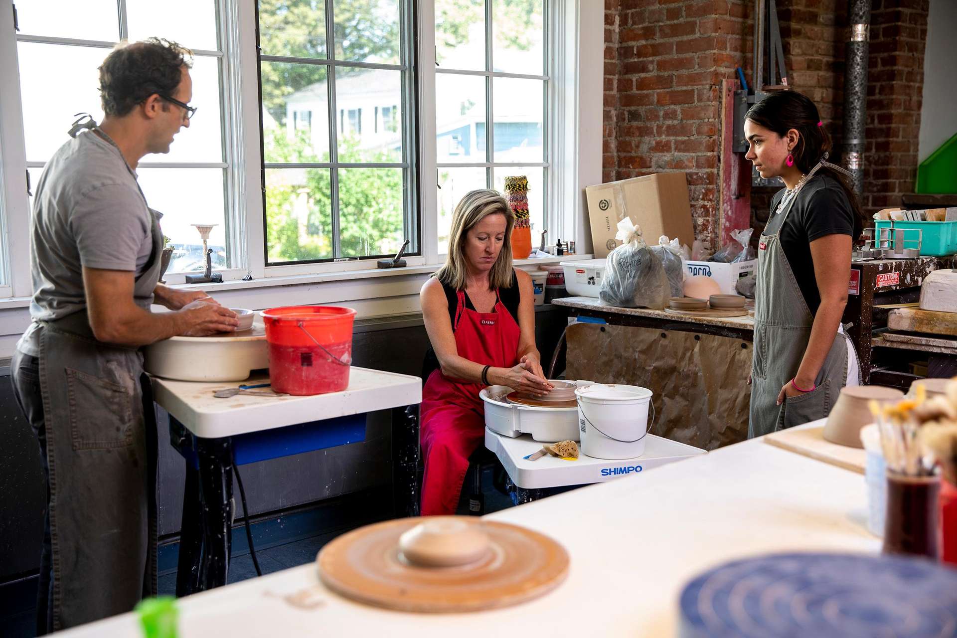 People in a pottery studio